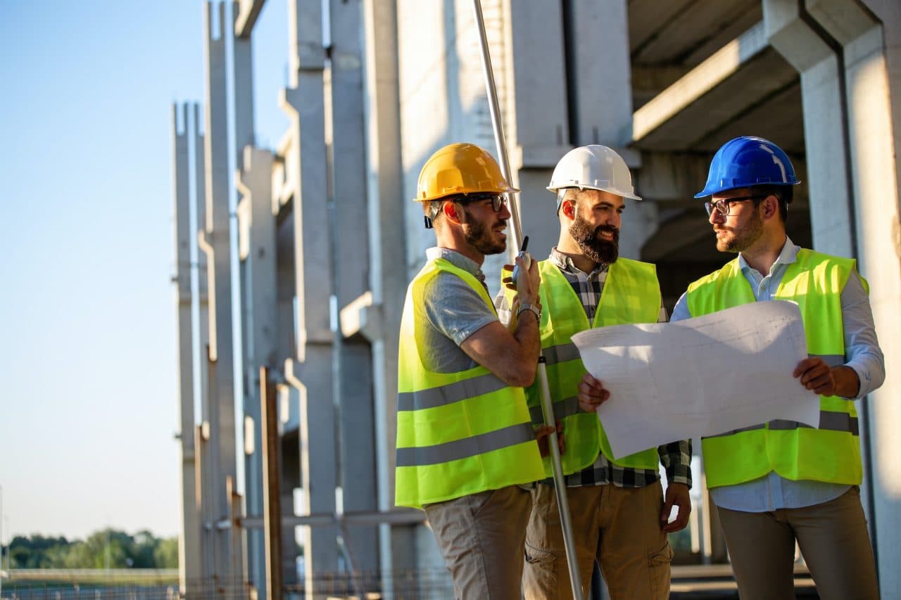 Civil engineers reviewing technical plans